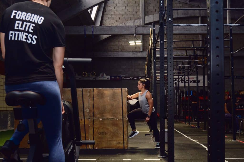 Athlete jumping over a box during CrossFit at CrossFit Moves in Antwerp
